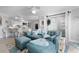 Bright living room showcasing an open layout, modern decor, and a comfortable blue sectional couch at 307 74Th Ave. N # 3C, Myrtle Beach, SC 29572