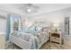 Inviting main bedroom featuring a king-size bed, coastal decor, and plenty of natural light at 307 74Th Ave. N # 3C, Myrtle Beach, SC 29572