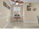 Bright breakfast nook with a decorative ceiling fan and nice backyard view at 3071 Alice Ln., Little River, SC 29566