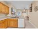 Bright kitchen with lots of cabinet space and light countertops, with an adjacent dining area at 3071 Alice Ln., Little River, SC 29566