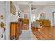 Spacious living room with wood floors, a fireplace, and elegant decor at 3071 Alice Ln., Little River, SC 29566