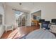 Living room with sliding glass doors and access to a well lit home office area at 3071 Alice Ln., Little River, SC 29566