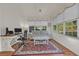 Bright sun room featuring natural light, wood floors and a comfy sofa at 3071 Alice Ln., Little River, SC 29566