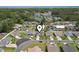 Aerial view showcasing the home's location in a quiet neighborhood near mature trees at 309 Rycola Circle, Surfside Beach, SC 29575
