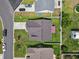 Birds eye view of a well-manicured yard with fenced in backyard and a patio area with awning at 309 Rycola Circle, Surfside Beach, SC 29575