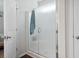 Bathroom featuring a glass-enclosed shower with tiled walls and a sleek design at 309 Rycola Circle, Surfside Beach, SC 29575