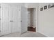 Neutral room highlighting double door closet and an open door leading to another room at 309 Rycola Circle, Surfside Beach, SC 29575