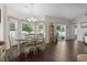 Inviting dining area with large windows and hardwood flooring at 309 Rycola Circle, Surfside Beach, SC 29575