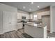 Well-appointed kitchen featuring modern appliances, ample cabinet space, and an island for meal prep at 319 Garden Grove St, Conway, SC 29526