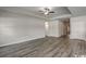Spacious living room with modern flooring and neutral paint, creating a bright and airy atmosphere at 319 Garden Grove St, Conway, SC 29526