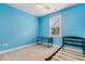 Blue bedroom featuring natural light and desk at 323 Waties Dr., Murrells Inlet, SC 29576