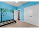 Blue bedroom with closet and decorated wall at 323 Waties Dr., Murrells Inlet, SC 29576