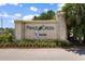 Prominent entrance to Prince Creek community featuring a stone sign, manicured flowerbeds, and clear signage at 323 Waties Dr., Murrells Inlet, SC 29576