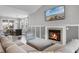 Comfortable living room featuring a fireplace and modern decor, perfect for relaxing and entertaining at 323 Waties Dr., Murrells Inlet, SC 29576