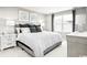 Cozy main bedroom with a soft color palette, complemented by two windows for ample natural light at 332 Myrtle Meadows Dr # 463A, Conway, SC 29526