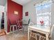 Cozy breakfast nook with multiple seating options and natural light from a window at 348 Hidden Cove Dr., Little River, SC 29566