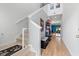 Spacious entryway with hardwood floors, a staircase with white banister, and neutral-colored walls at 348 Hidden Cove Dr., Little River, SC 29566