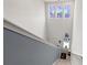 Bright stairwell with colorful decorative window films at 348 Hidden Cove Dr., Little River, SC 29566