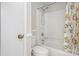 Bathroom with a tub and shower with a white shower curtain with a fish design at 351 Lake Arrowhead Rd. # 24-396, Myrtle Beach, SC 29572