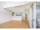 Spacious living area with laminate floors, vaulted ceilings, and seamless flow to the modern kitchen at 351 Lake Arrowhead Rd. # 24-396, Myrtle Beach, SC 29572