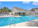 Community pool with lounge chairs and ample deck space in a pleasant setting at 351 Lake Arrowhead Rd. # 24-396, Myrtle Beach, SC 29572