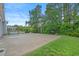 Enjoy outdoor activities on the private basketball court in the backyard with mature tree views at 3620 Diamond Stars Way, Little River, SC 29566