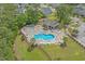 Community pool area with sun loungers, tables, and chairs at 3620 Diamond Stars Way, Little River, SC 29566