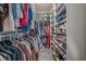 Walk-in closet with custom shelves, hanging rods, and ample space for organization at 3620 Diamond Stars Way, Little River, SC 29566