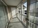 View of the balcony showing the storage closet and railing, with natural light and shade at 3761 Citation Way # 531, Myrtle Beach, SC 29577