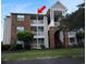 Exterior view of a condo building featuring balconies, brick accents, and well-maintained landscaping at 3761 Citation Way # 531, Myrtle Beach, SC 29577