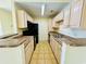 Bright kitchen featuring neutral countertops, light wood cabinets, and black appliances at 3761 Citation Way # 531, Myrtle Beach, SC 29577