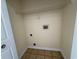 Dedicated laundry area has tile floors and necessary hookups ready for appliances at 3761 Citation Way # 531, Myrtle Beach, SC 29577