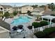 Aerial view of the community pool and grilling area with lush landscaping at 3761 Citation Way # 531, Myrtle Beach, SC 29577