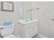 Bright bathroom featuring a white vanity with storage and seashell patterned flooring at 404 1St Ave. N # H, North Myrtle Beach, SC 29582