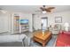 Spacious living room offers a comfortable seating area, TV, and access to the dining space at 404 1St Ave. N # H, North Myrtle Beach, SC 29582
