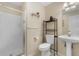 Bathroom with shower, toilet, and pedestal sink at 425 Mallard Lake Circle, Surfside Beach, SC 29575