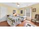 Bedroom features twin beds, ceiling fan, and sunny window at 425 Mallard Lake Circle, Surfside Beach, SC 29575