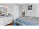 Bedroom with hardwood floors, neutral walls and attached bathroom at 425 Mallard Lake Circle, Surfside Beach, SC 29575