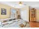 Bedroom featuring twin beds, ceiling fan, sunny window, and closet at 425 Mallard Lake Circle, Surfside Beach, SC 29575