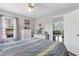 Bedroom featuring hardwood floors, closet, and natural light at 425 Mallard Lake Circle, Surfside Beach, SC 29575