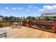 Back deck with waterfront view, perfect for outdoor dining or relaxing at 425 Mallard Lake Circle, Surfside Beach, SC 29575