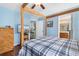 Bright main bedroom with bamboo furniture, hardwood floors and adjacent bathroom at 425 Mallard Lake Circle, Surfside Beach, SC 29575