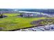 Scenic aerial view of waterfront homes, marina, and lush green landscape, a beautiful coastal community at 4350 Intercoastal Dr. # 2402, Little River, SC 29566