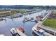 Aerial view of the marina with boats docked at the piers at 4350 Intercoastal Dr. # 2402, Little River, SC 29566