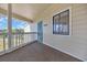 View of a balcony with a cream-colored exterior and a lake view at 4350 Intercoastal Dr. # 2402, Little River, SC 29566