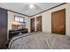 Bedroom featuring a cozy bed, a ceiling fan, and storage with closet space at 4350 Intercoastal Dr. # 2402, Little River, SC 29566