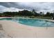 Large community pool with surrounding deck and landscaping, offering a refreshing outdoor amenity at 4350 Intercoastal Dr. # 2402, Little River, SC 29566