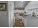 Bright kitchen with white cabinets, granite countertops and stainless appliances at 4450 Turtle Ln. # 2-A, Little River, SC 29566