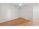 Bedroom features hardwood floors, a ceiling fan, and a double closet at 4520 Coquina Harbour Dr. # F-3, Little River, SC 29566