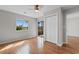 Well-lit bedroom boasts laminate flooring, closet, and sliding glass doors to outdoor space at 4520 Coquina Harbour Dr. # F-3, Little River, SC 29566